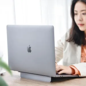 Adjustable desktop laptop stand