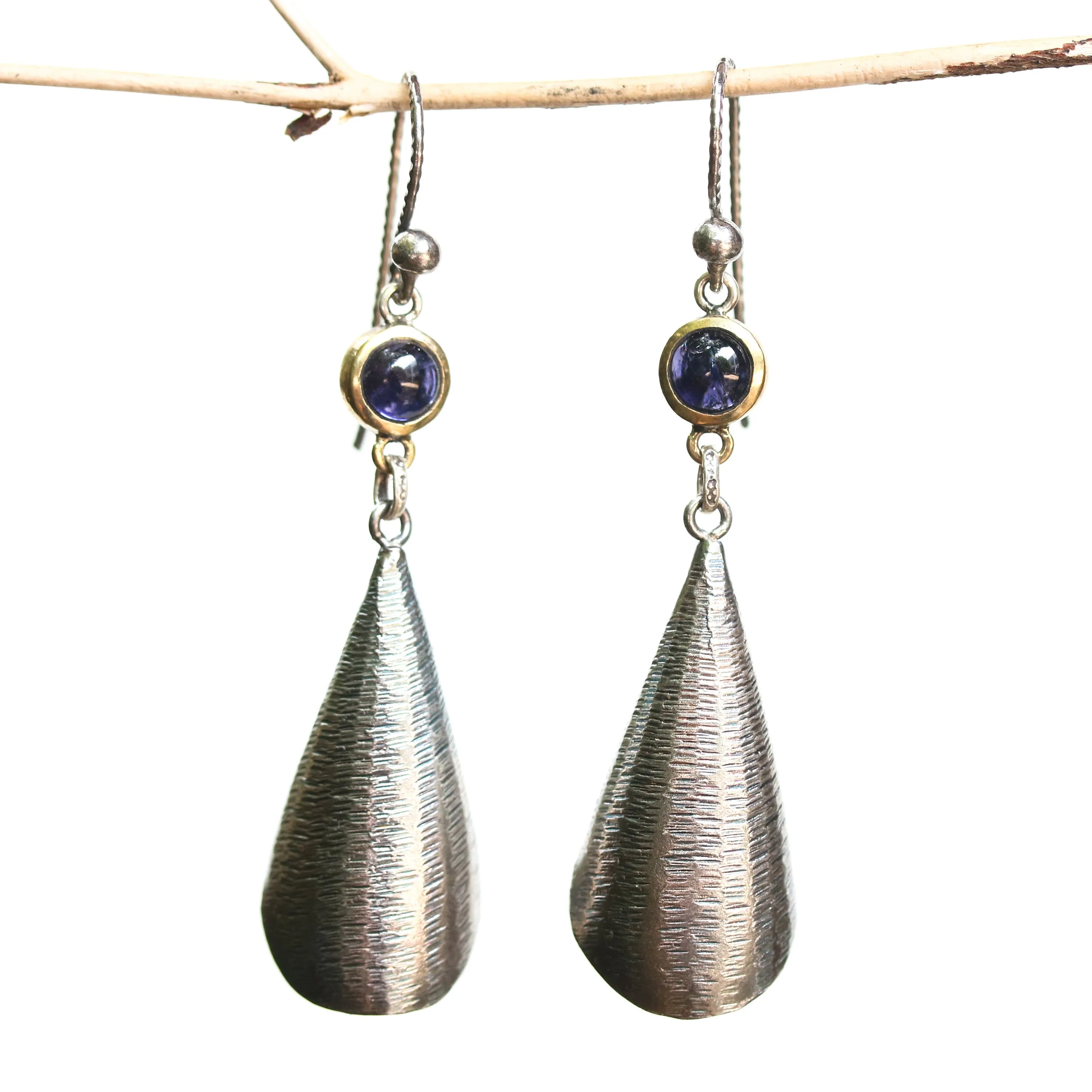 Silver leaf shape earrings with textured and tiny Iolite in brass bezel setting on oxidized sterling silver hooks style