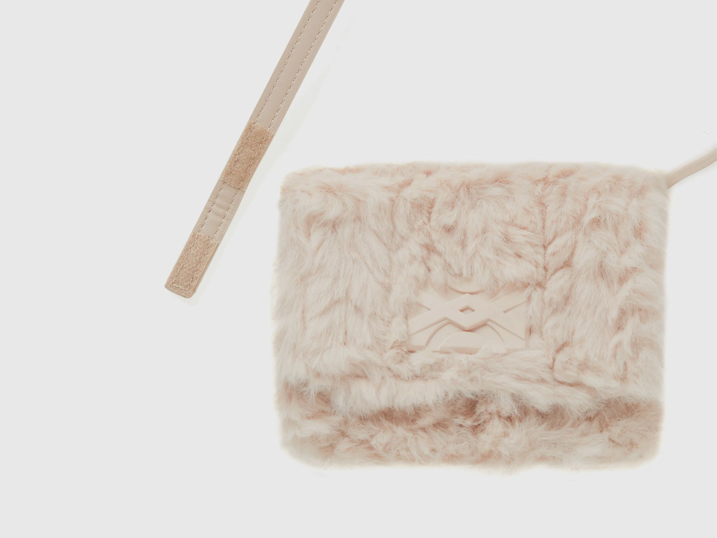 Textured Sling Bag with Spacious Interior and Secure Buckle Closure
